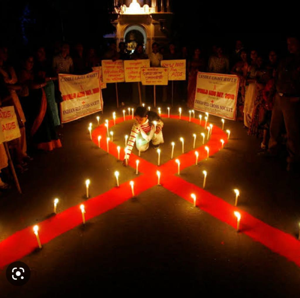 A group of students and faculty members celebrate Christmas at Vidya Siri College of Pharmacy.
